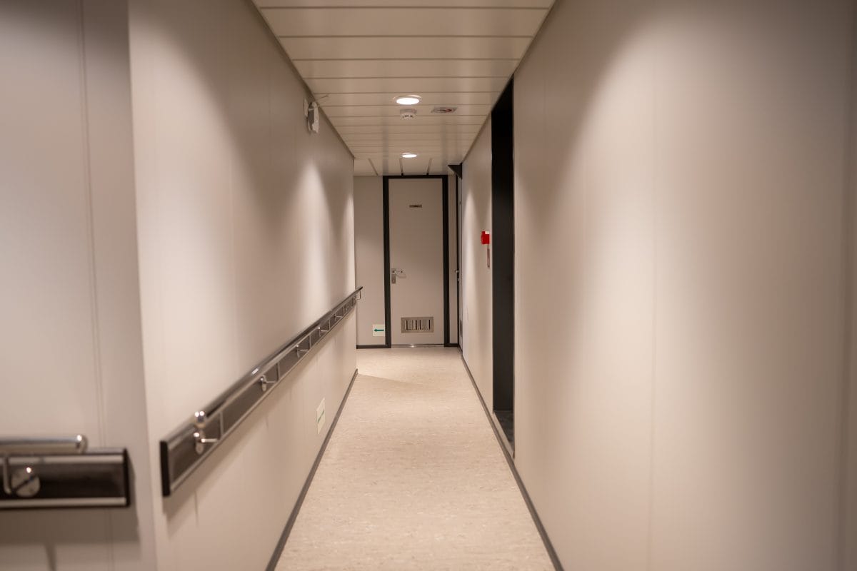 Accomar Minimalist Carpeted Corridor Interior